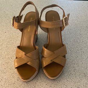 Super cute tan BCBG wedges.Worn a handful of times but no longer fit my fat foot